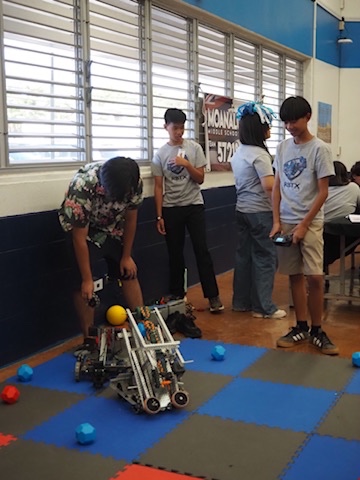 Moanalua Middle School robotics team working together